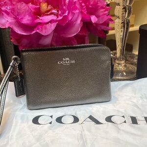 Coach Metallic Silver Wristlet with dust bag.   LIKE NEW!